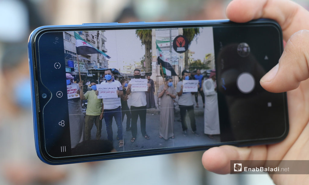 A protest in Idlib city against fuel prices’ increase and high living costs – 04 August 2020 (Enab Baladi / Anas al-Khouli)