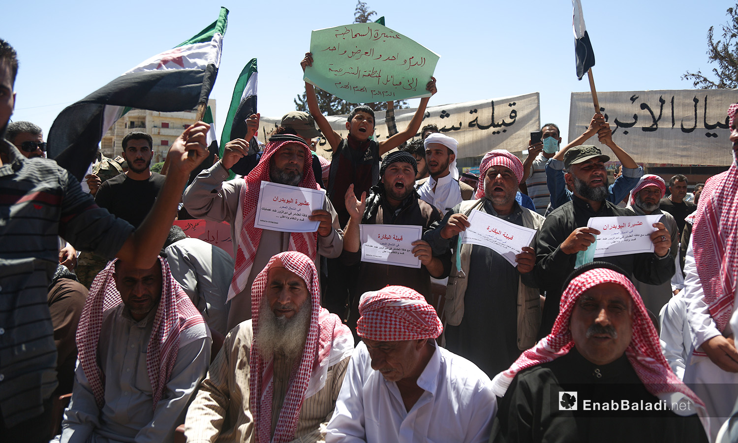 A protest stand in Sarmada town of Idlib countryside in solidarity with Syria’s eastern region’s clans and in protest against the assassination operations of a number of their sheikhs – 07 August 2020 (Enab Baladi / Yousef Ghuraibi)