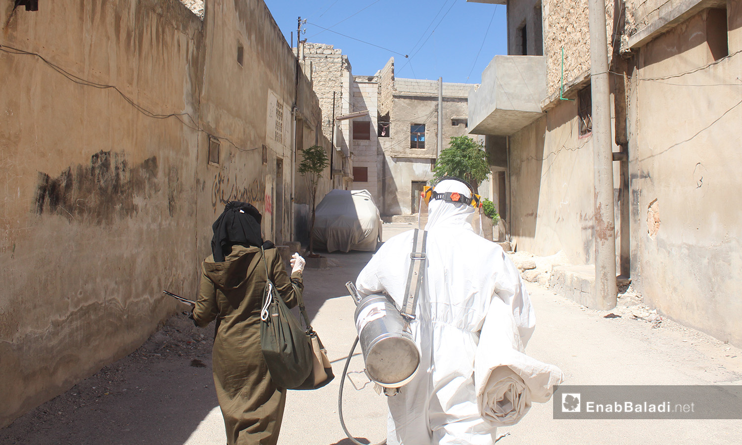 An insecticide spraying and awareness campaign on the Leishmaniasis disease in Idlib countryside – August 2020 (Enab Baladi / Iyad Abdel Jawad)