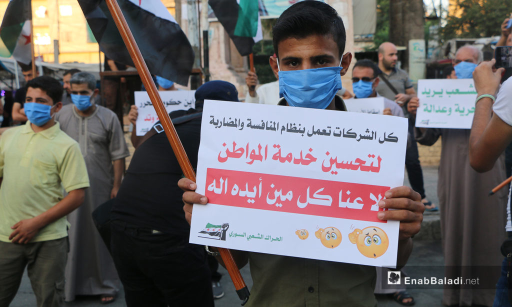 A protest in Idlib city against fuel prices’ increase and high living costs – 04 August 2020 (Enab Baladi / Anas al-Khouli)