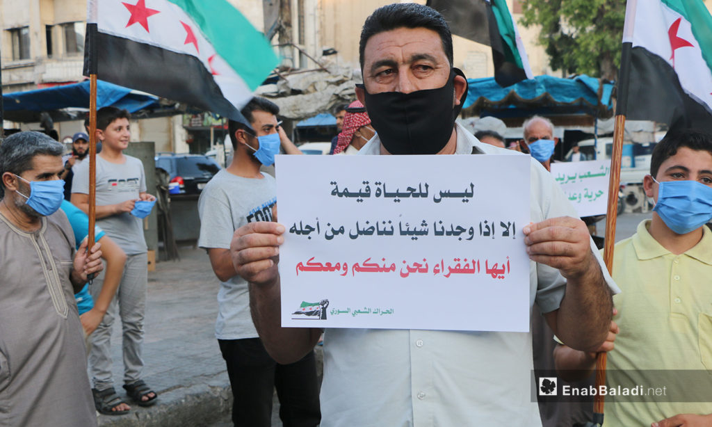 A protest in Idlib city against fuel prices’ increase and high living costs – 04 August 2020 (Enab Baladi / Anas al-Khouli)