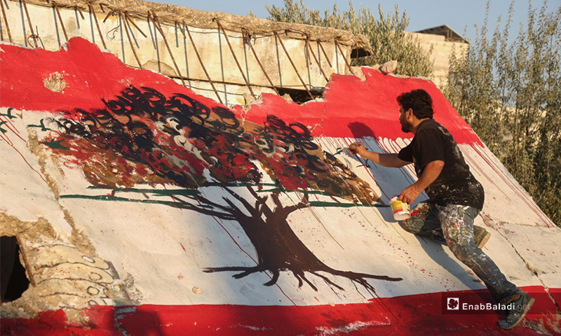 Aziz al-Asmar draws a mural in solidarity with Beirut (Exclusive by Enab Baladi)