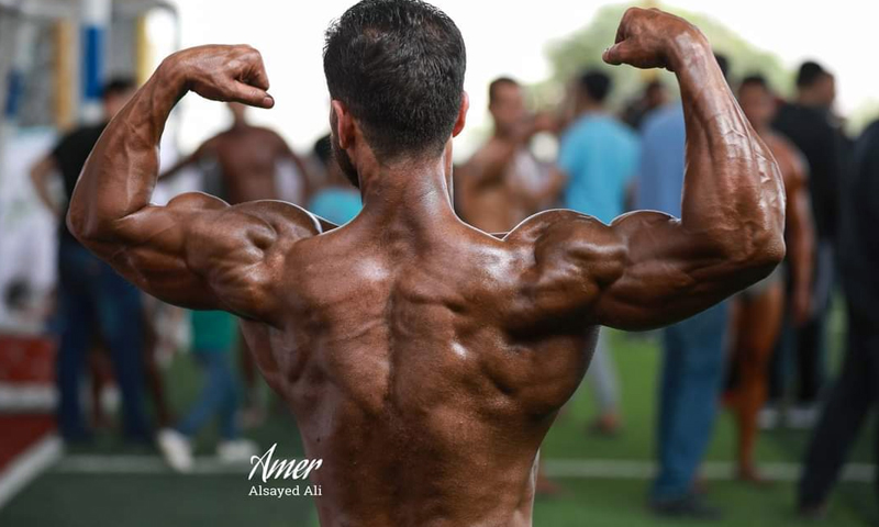 A participant in a local bodybuilding and fitness contest in Salqin, north of Idlib - 12 September 2020 (Amer Sayed Ali)