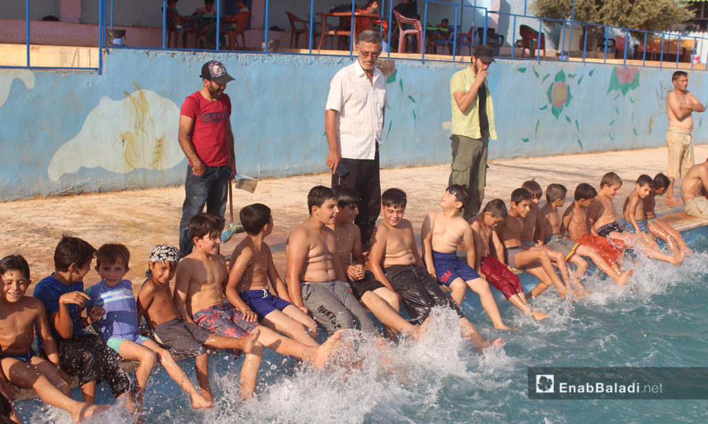 Preparations for the swimming practice in Killi town in northern Idlib countryside – September 2020 (Enab Baladi / Iyad Abdel Jawad)