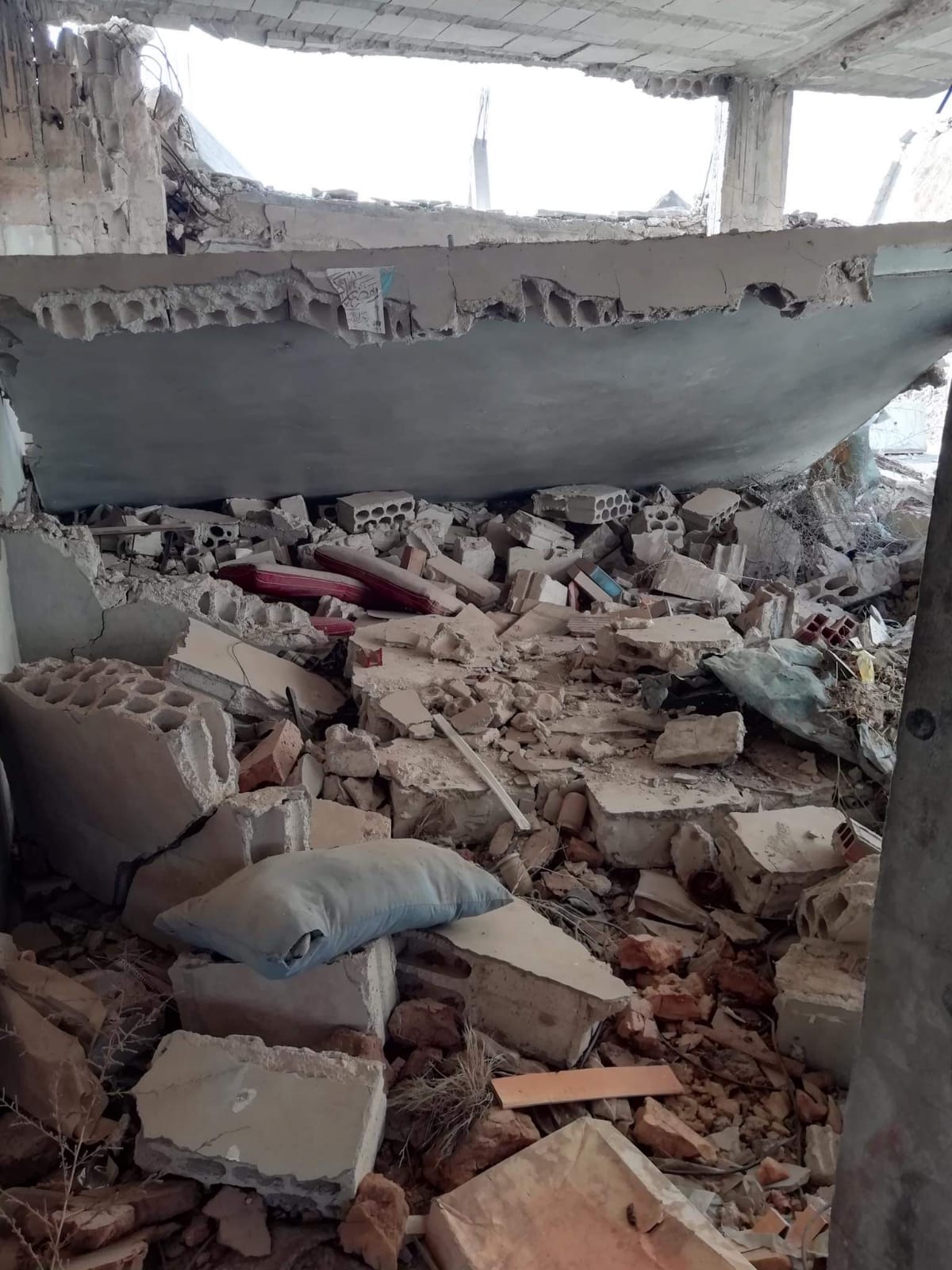 Syrian journalist Mohammed al-Zahuri's destroyed house in al-Qusayr city 