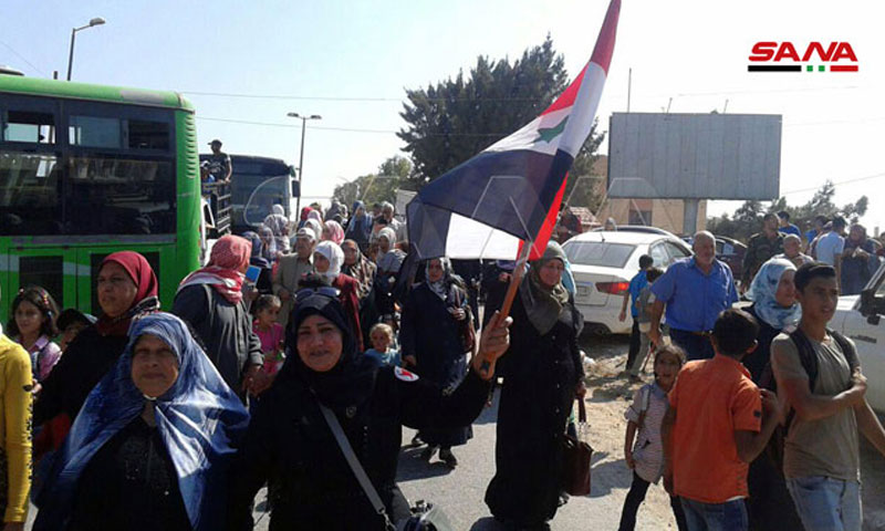 Residents of al-Qusayr city in the western Homs countryside while returning to their city - 02 October 2019 (SANA)