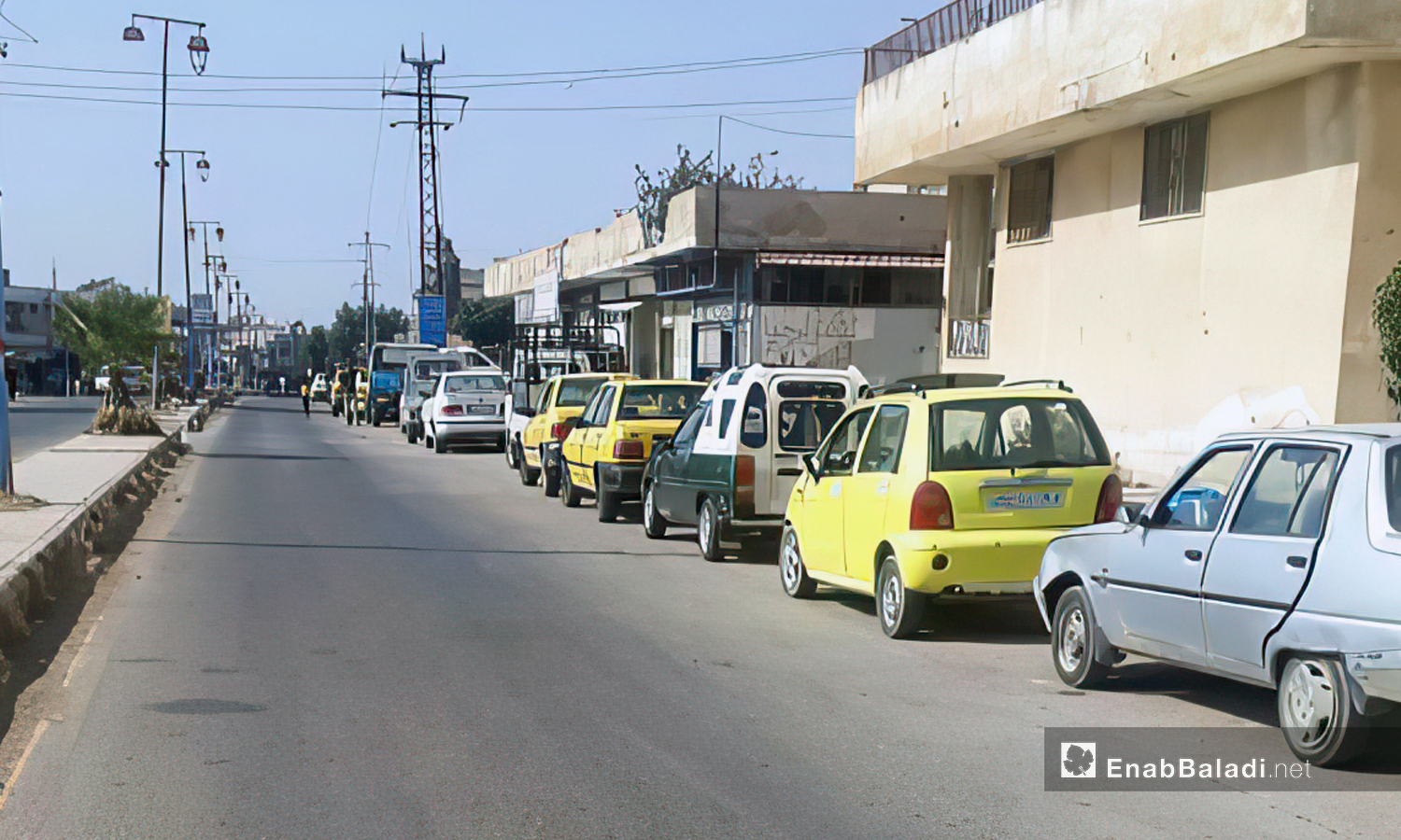 A long queue at a gas filling station in the town of Muzayrib in Daraa - September 2020 (Daraa–Halim Muhammad)
