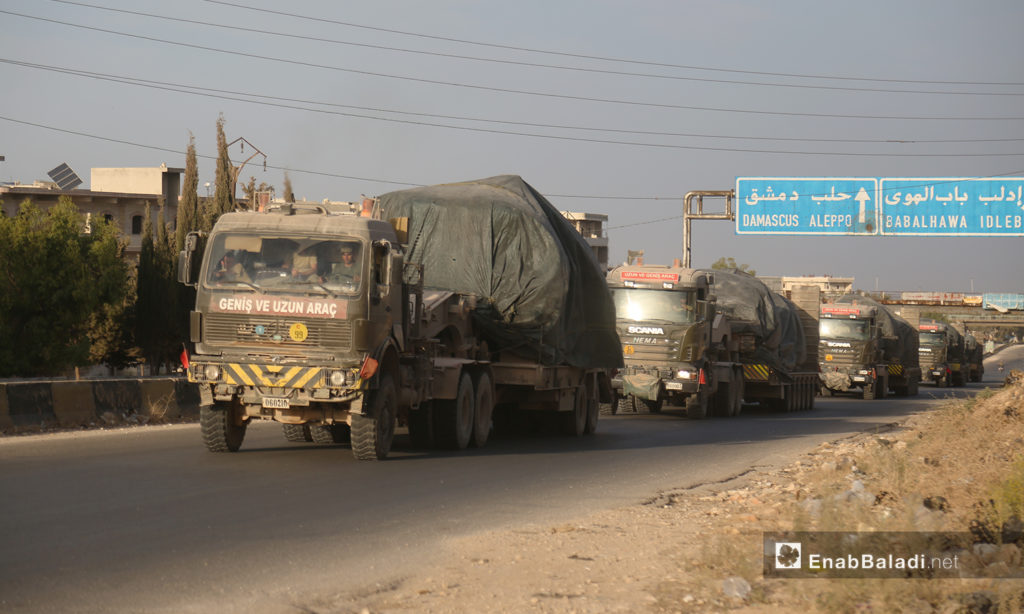 Turkish military vehicles evacuate a military observation post in northern Hama heading to the village of Kokfeen in Jabal al-Zawiya, south of Idlib - 20 October 2020 (Enab Baladi / Yousef Ghuraibi)