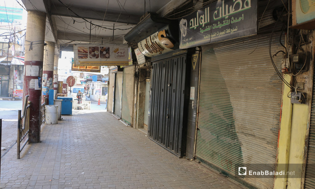 Closed shops in Idlib city due to a partial strike to condemn the Russian massacre, which left tens of fatalities in a training camp for the “Sham Legion” faction- 27 October 2020 (Enab Baladi \ Anas al-Khouli)