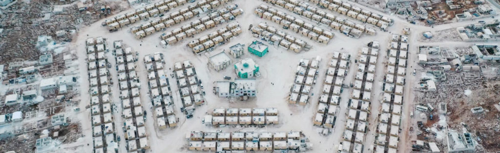 An aerial view of a camp for internally displaced people in the form of a five-pointed network near the town of Kafr Lusin in north-western Syria - 29 September 2020 (AFP / Omar Haj Kaddour)