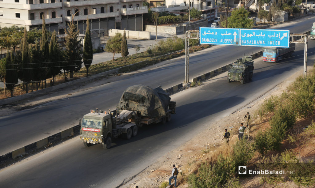 Turkish military vehicles evacuate a military observation post in northern Hama heading to the village of Kokfeen in Jabal al-Zawiya, south of Idlib - 20 October 2020 (Enab Baladi / Yousef Ghuraibi)