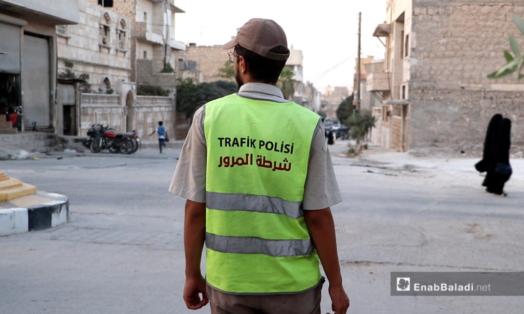 A traffic policeman in the city of al-Bab in the countryside of Aleppo - September 2020 (Enab Baladi)