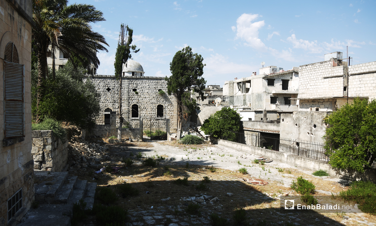 “Mar Georges” Church for the Greek Orthodox in Jisr al-Shughur city in the Southern Idlib countryside still has its structure despite being bombed during the war years in Syria – July 2020 (Enab Baladi)