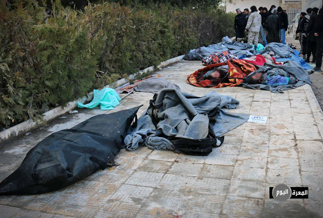 Dead bodies of civilians killed in the Justice Palace massacre in Ma`arat al-Nu`man (ALMarra Today)