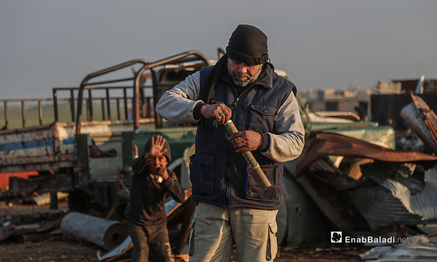 Abu Ahmad, an engineer, has gained sufficient experience to deal with unexploded ordnance (UXO)“safely” during the past ten years, mainly because he was in the military- 5 March 2021 (Enab Baladi-Youssef Gharibi)