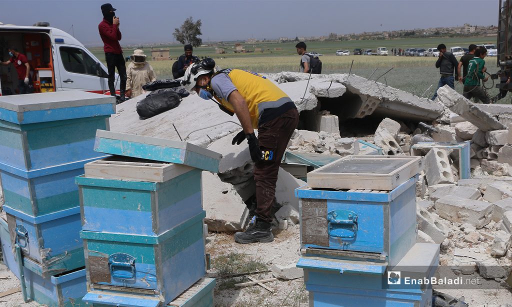 A civil defense volunteer checking the explosion site - 03 May 2021 (Anas al-Khouli / Enab Baladi)