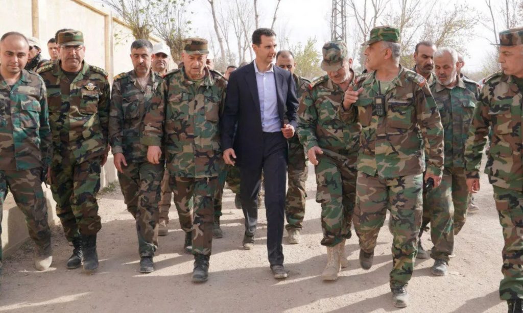 Head of the Syrian regime Bashar al-Assad visiting forces in rural Damascus -18 March 2018 (SANA)