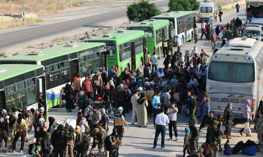 Families deported from Quneitra following a settlement agreement with the Syrian regime — 21 July 2018 (Anadolu Agency)