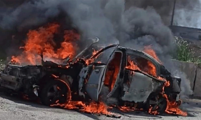 A car on fire, affected by an IED blast, near the Masaken Jaleen Roundabout in the western countryside of Daraa – 22 May 2021 (Firas al-Ahmad’s Facebook Page)