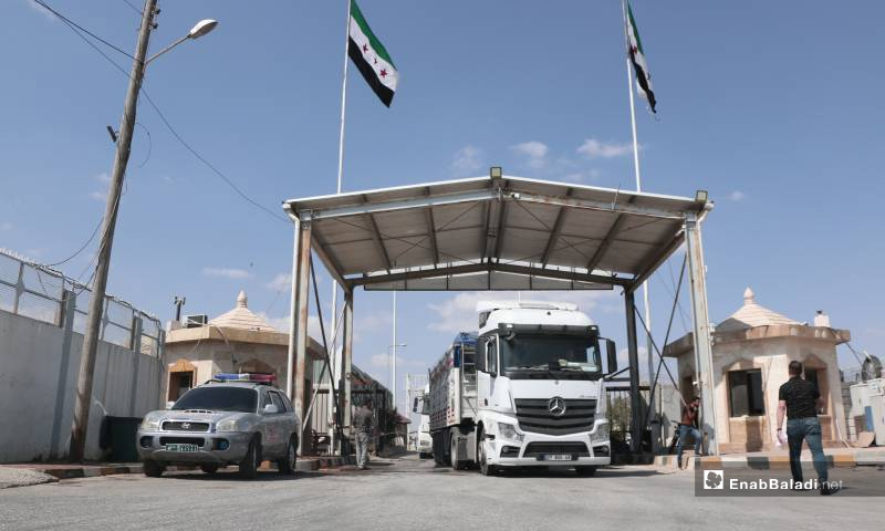 Turkish commercial trucks entering Syrian territory through the Bab al-Salama crossing- 11 June 2021 (Enab Baladi-Walid Othman)