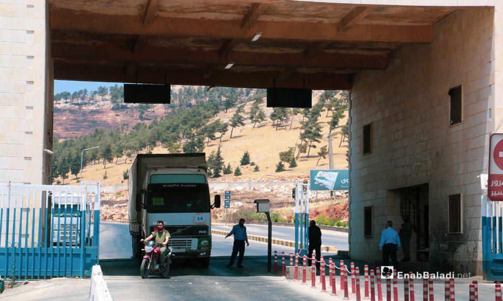 The entry of the final cross-border humanitarian aid convoy through the Bab al-Hawa crossing in Idlib – 2 June 2021 (Enab Baladi / Walid Othman)
