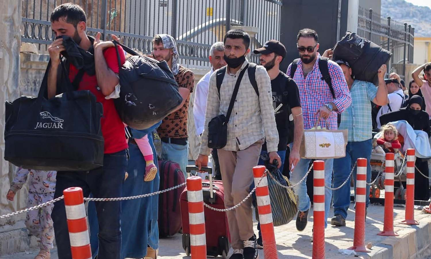 Syrians at the Bab al-Hawa Border Crossing during the Eid al-Adha visit - 18 July 2021 (Bab al-Hawa Border Crossing)