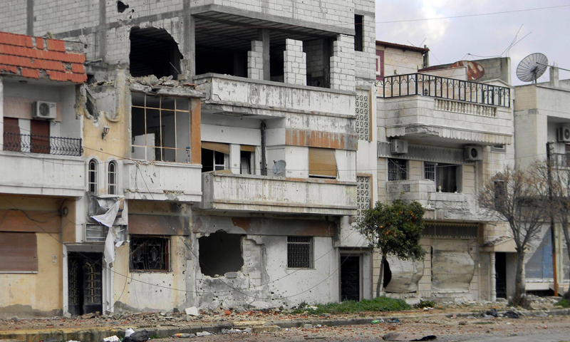 Civilian dwellings destroyed by the Syrian regime forces in Homs city in central Syria - 11 February 2012 (AFP)