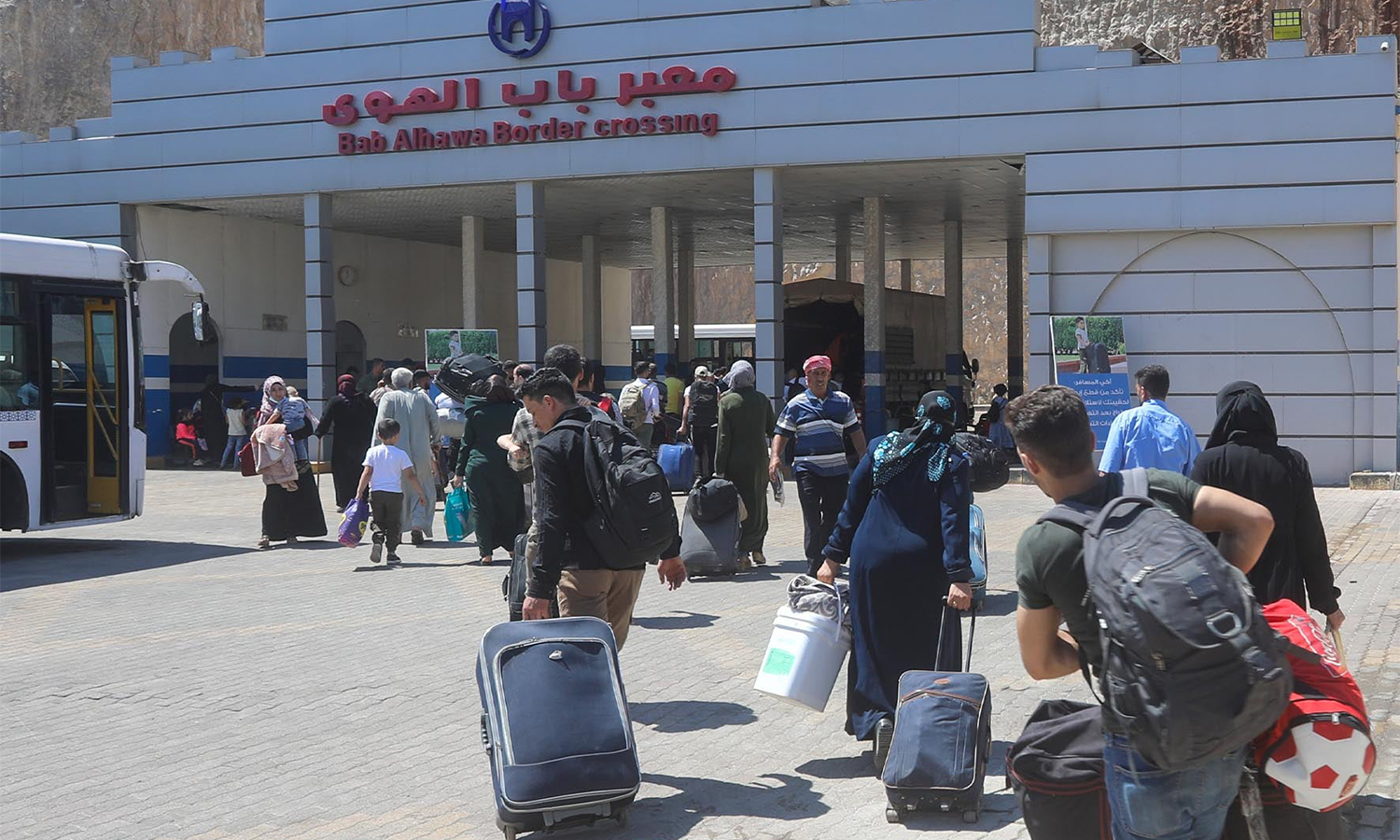 Syrians entering the Bab al-Hawa border crossing to spend the Eid al-Adha holiday in Syria - 15 July 2021 (the Bab al-Hawa Border Crossing official Facebook account)