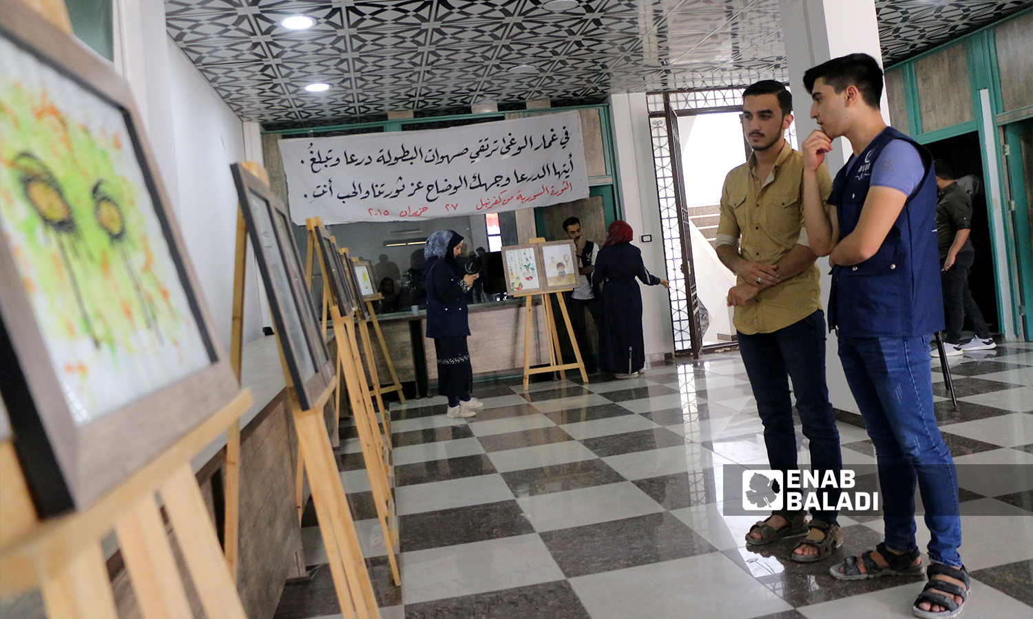An art exhibition under the slogan “Do Not Suffocate Truth” was held in Azaz city in Aleppo governorate in remembrance of the Eastern Ghouta’s chemical massacre - 21 August 2021 (Enab Baladi / Walid Othman)
