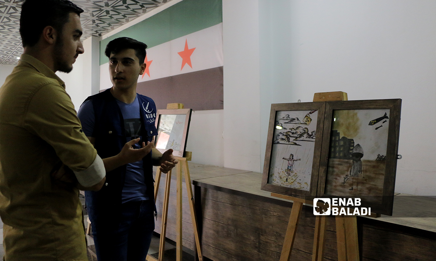 An art exhibition under the slogan “Do Not Suffocate Truth” was held in Azaz city in Aleppo governorate in remembrance of the Eastern Ghouta’s chemical massacre - 21 August 2021 (Enab Baladi / Walid Othman)
