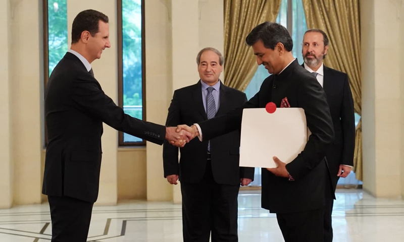 The head of the Syrian regime, Bashar al-Assad, accepting the credentials of the new Indian Ambassador to Syria, Mahender Singh Kanyal, in Syria’s People’s Assembly - 26 August 2021 (SANA)