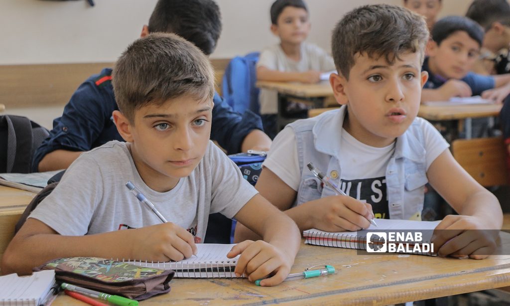 Primary school pupils sitting at their desks in Azaz, northern countryside of Aleppo - 22 September 2021 (Enab Baladi-Walid Othman)