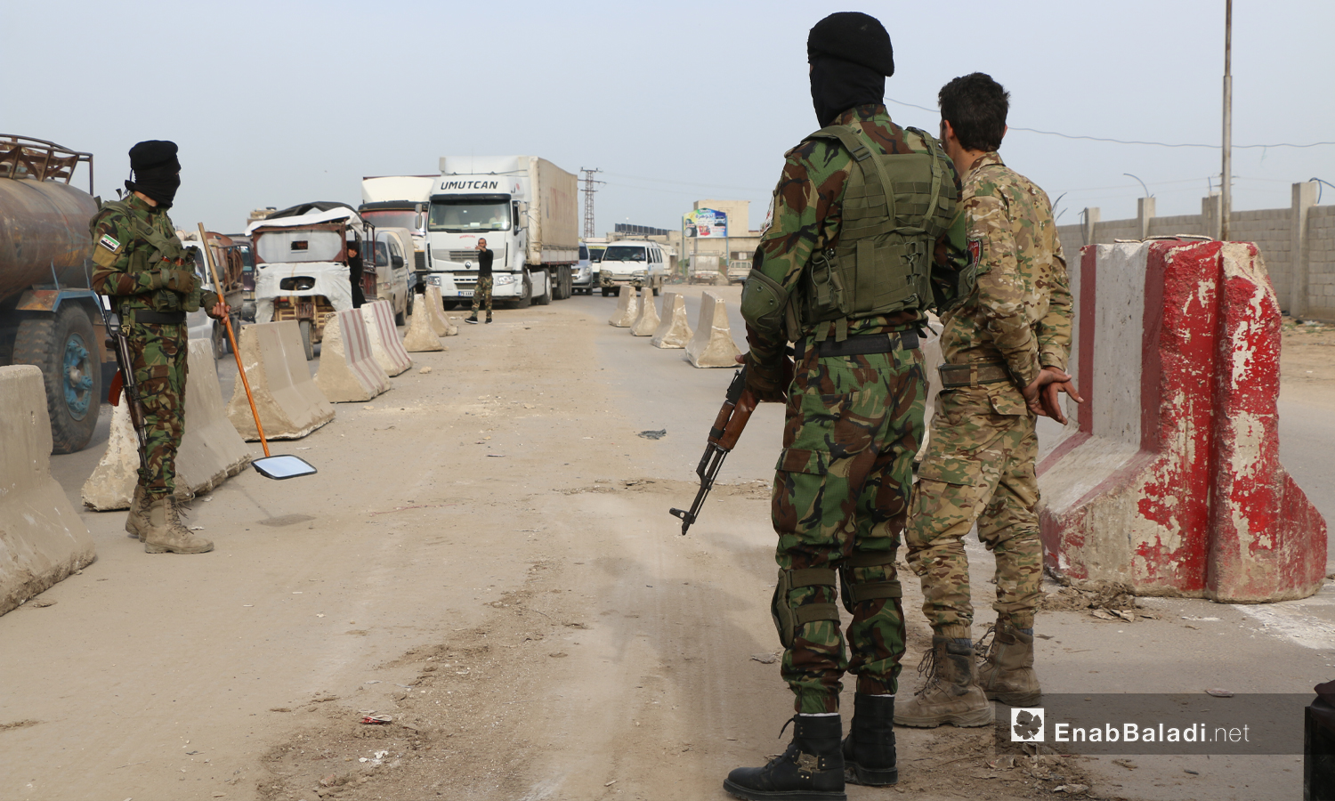 Members of the Turkish-backed Syrian National Army at a checkpoint placed at the eastern entrance of Azaz city in the northern countryside of Aleppo- 17 April 2021 (Enab Baladi- Walid Othman)