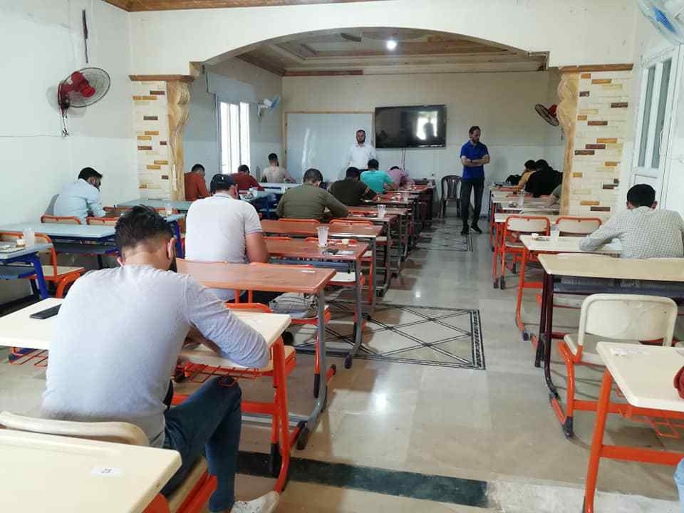 Students taking an exam at the private Mari University in Idlib, 1 July 2021 (Mari University)