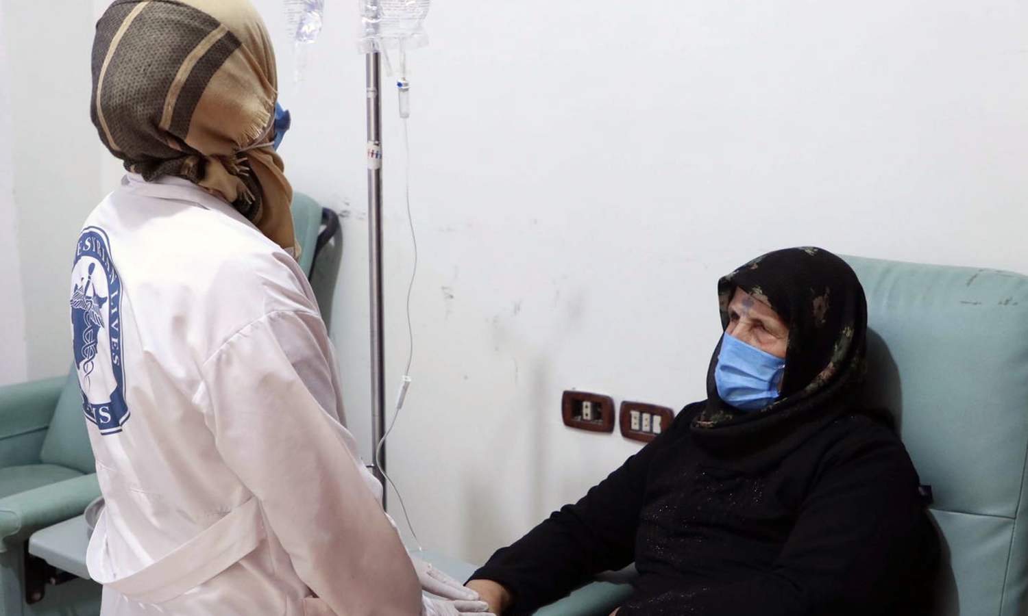 A patient undergoing breast cancer examination at SAMS’ hospital in Idlib countryside - 8 October 2021 (SAMS)