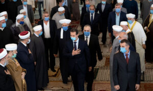 The head of the Syrian regime, Bashar al-Assad, attending a religious festival to mark the birth anniversary of Prophet Mohammed “PBUH” at the Imam al-Shafi’i Mosque in the Mezzeh neighborhood in Damascus - 18 October 2021 (the official Facebook account of the Syrian Presidency)
