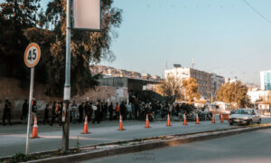 Syrian citizens lining in long queues to get bread in the Mezzeh area in Damascus - 13 December 2021 (Lens Young Dimashqi)