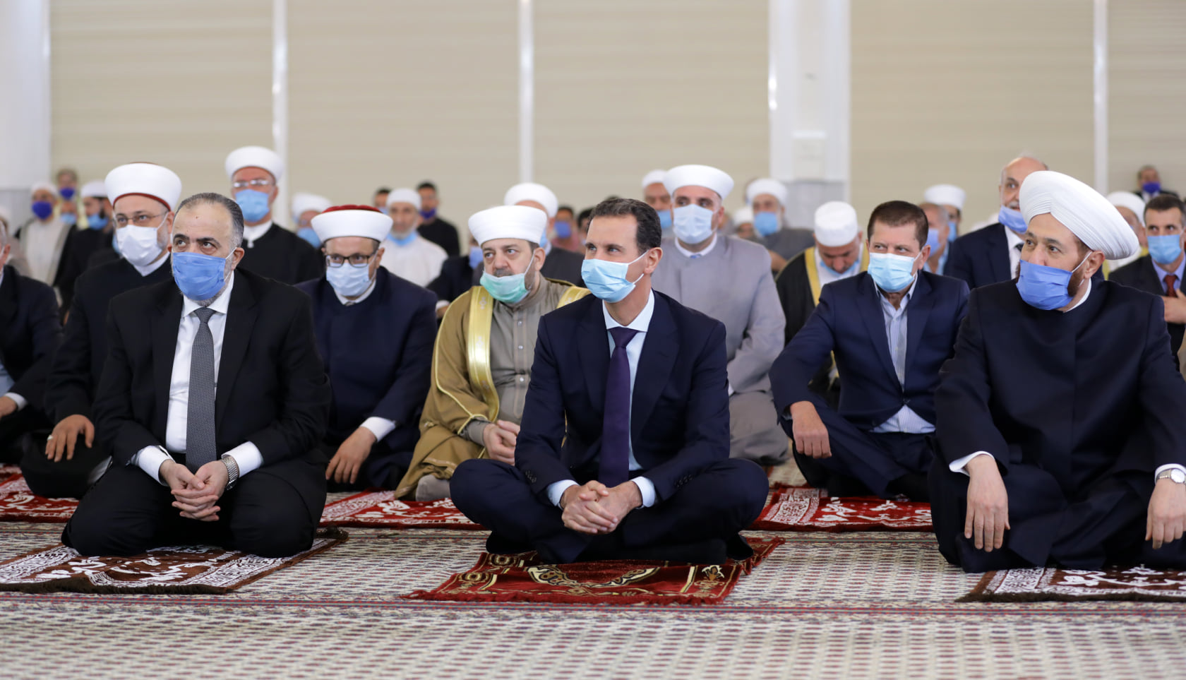 The head of the Syrian regime, Bashar al-Assad, attending a religious festival to mark the birth anniversary of Prophet Mohammed “PBUH” at the Imam al-Shafi’i Mosque in the Mezzeh neighborhood in Damascus - 18 October 2021 (the official Facebook account of the Syrian Presidency)