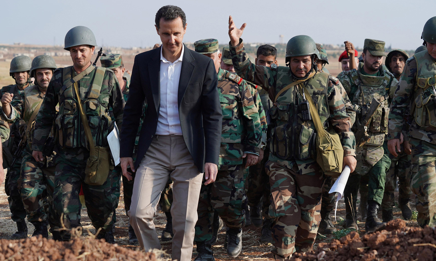 The head of the Syrian regime Bashar al-Assad visiting military units stationed in Idlib governorate in northwestern Syria - 23 October 2019 (SANA)