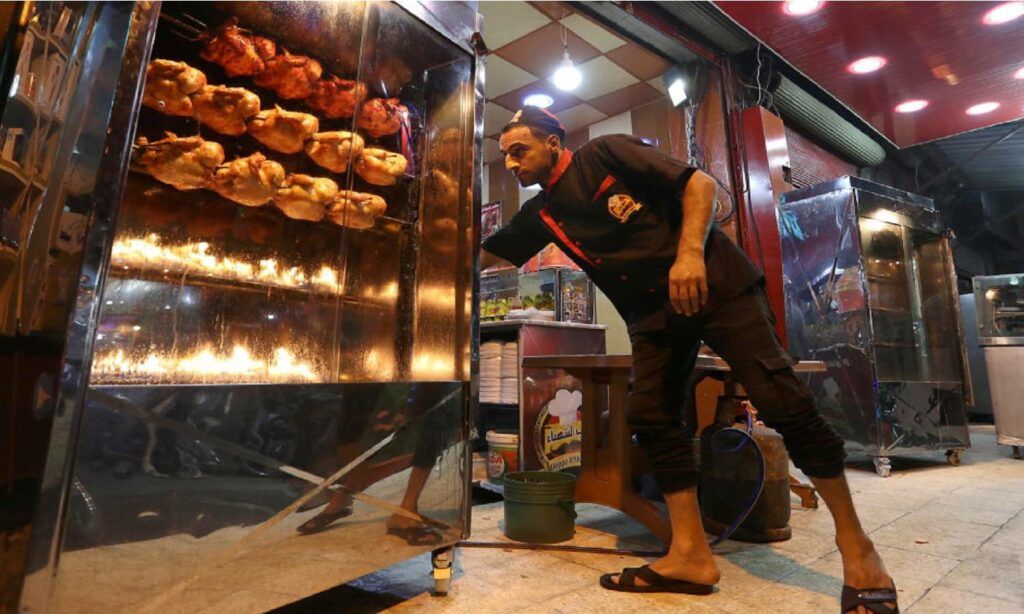 A takeaway shop in Syria (AFP)