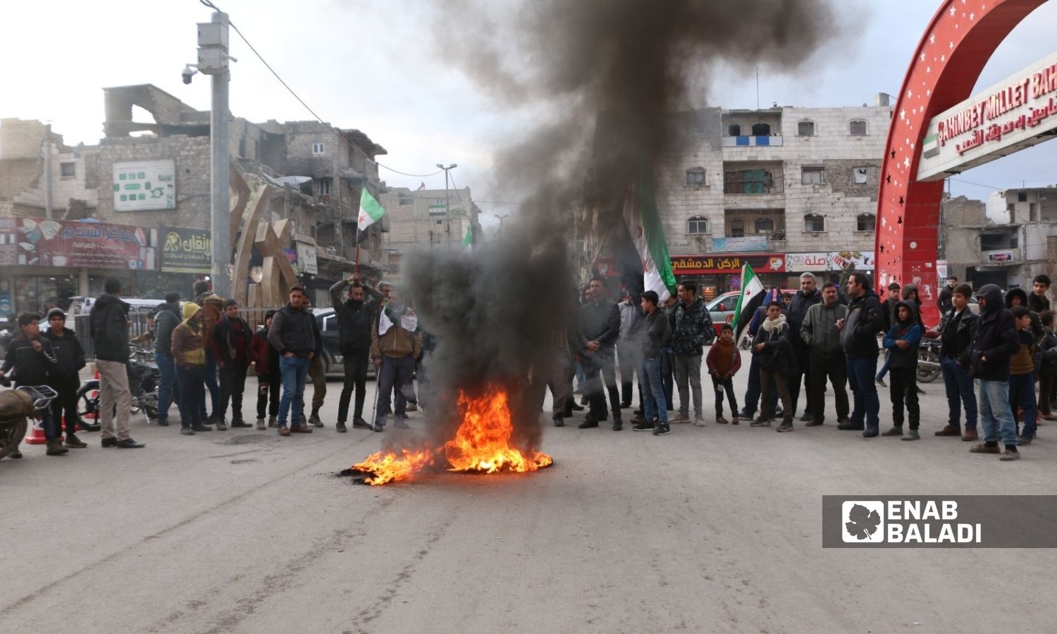 A demonstration in front of the Center roundabout in the city of al-Bab in the eastern countryside of Aleppo, 5 January 2022 (Enab Baladi / Siraj Muhammad)