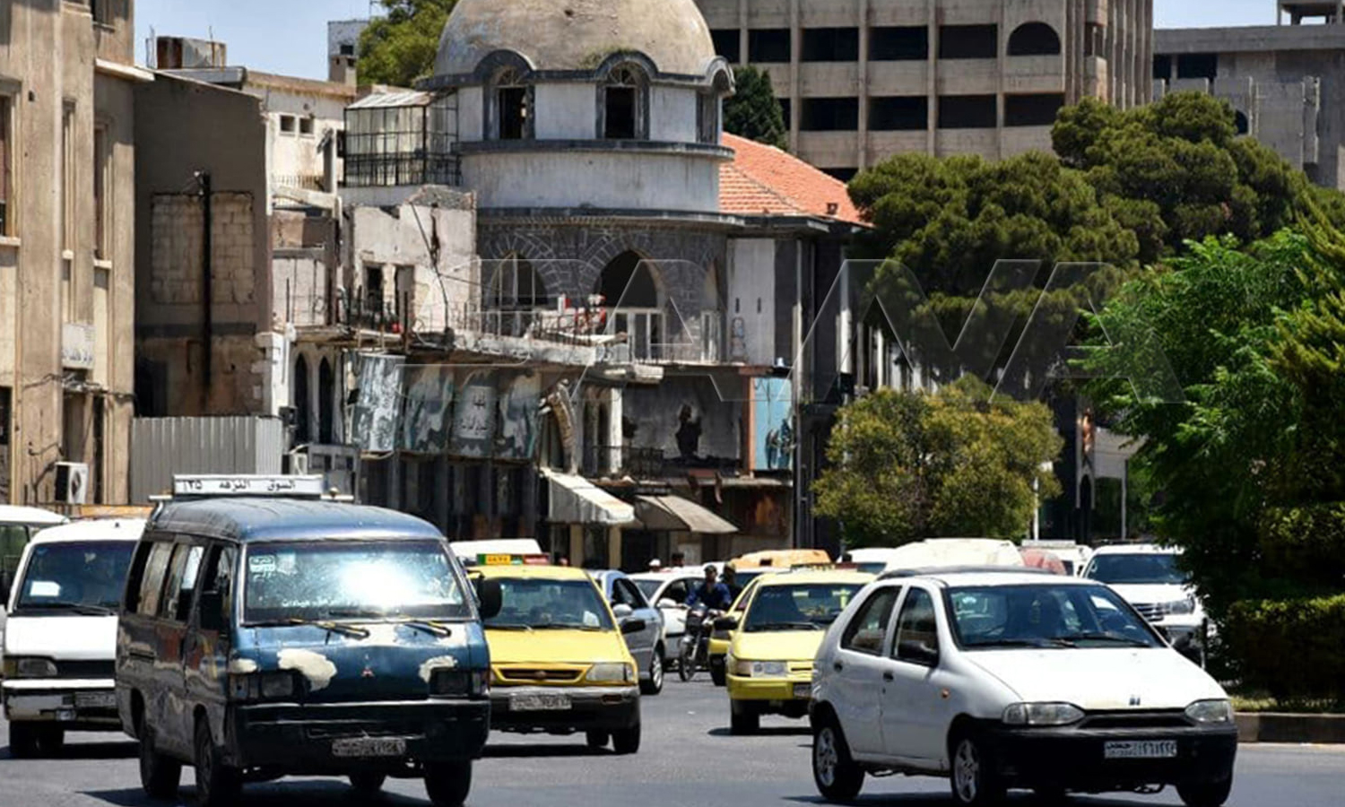 Cars and pedestrians in central Homs city - 30 July 2021 (SANA)