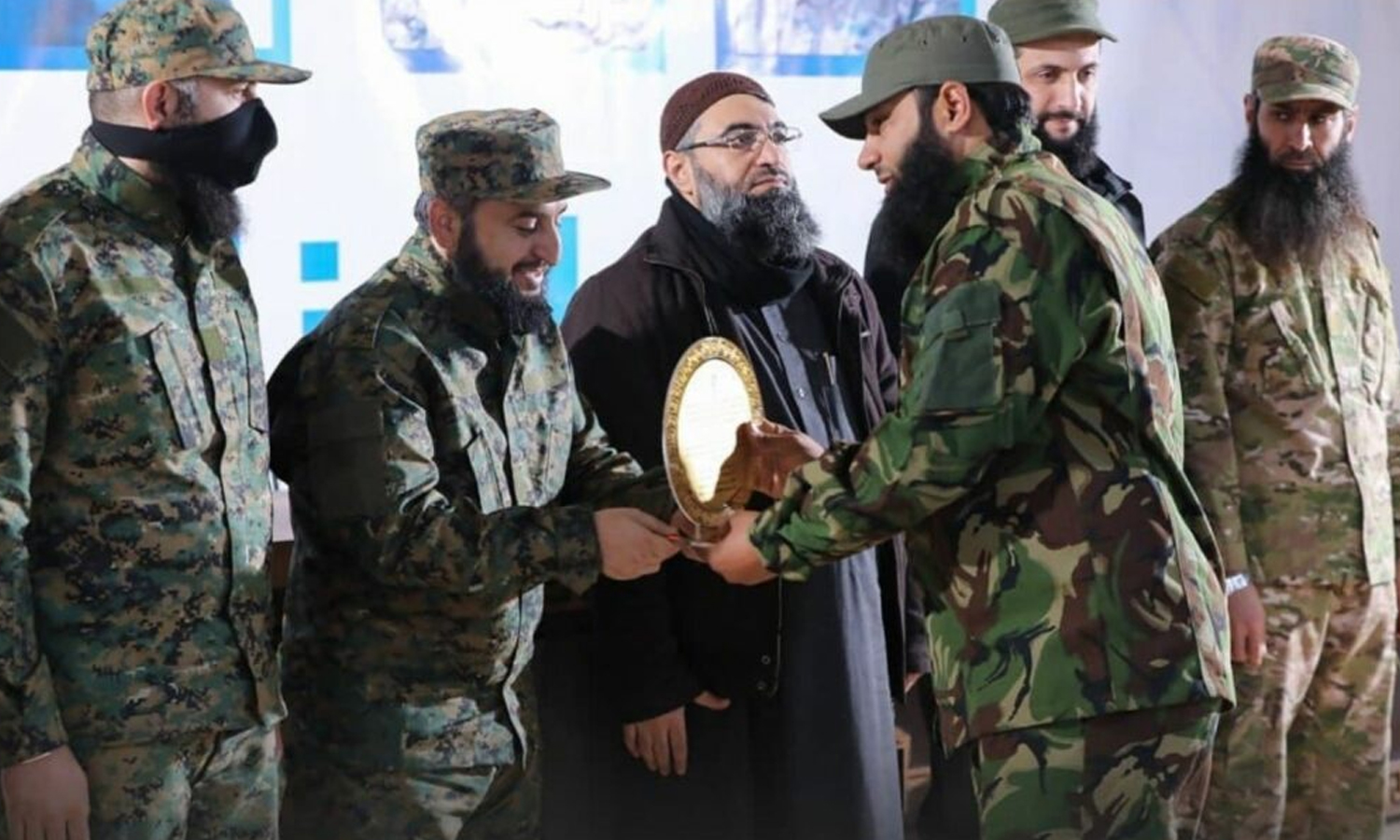 Commanders of HTS honoring senior fighters of the “Battalions Leaders” qualifying course, 2 February 2022 (Amjad Media)