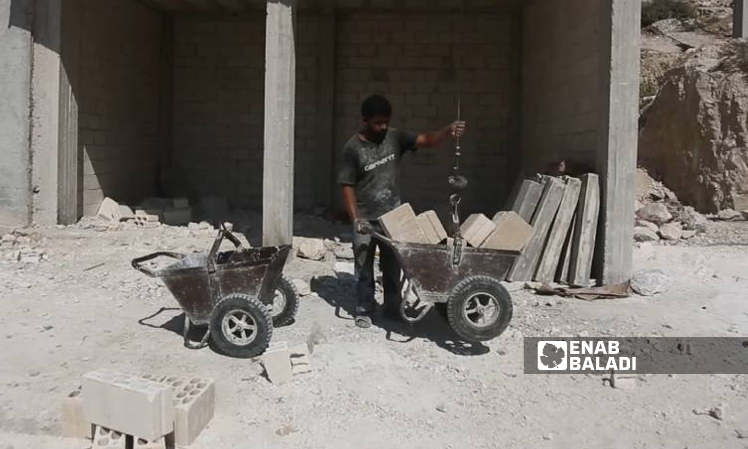 A worker in a construction workshop in the countryside of Idlib, northwest Syria - 18 April 2022 (Enab Baladi / Iyad Abdul Jawad)