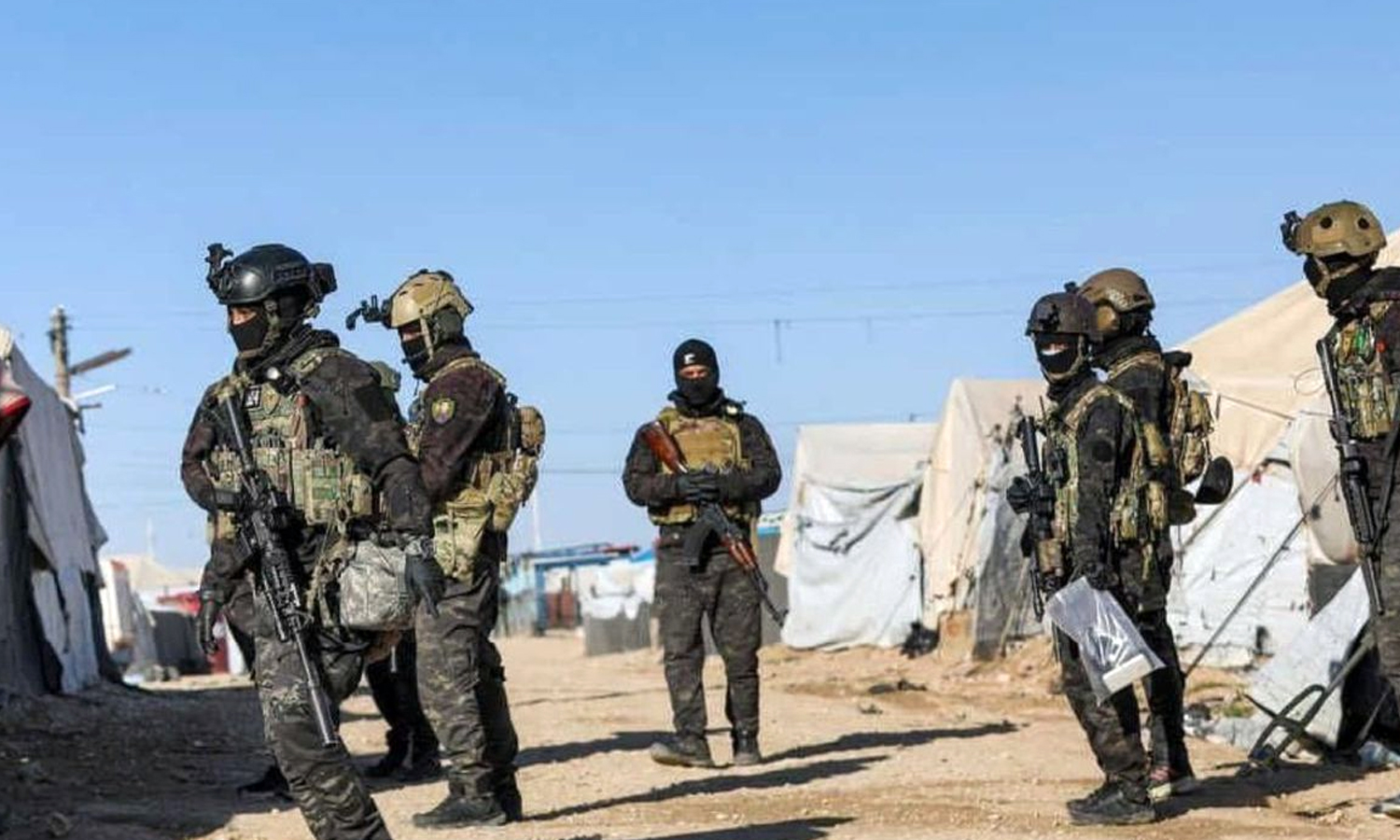 Troops of the US-backed SDF while carrying out an arrest campaign inside Ratla camp in the southeastern countryside of Raqqa - 6 May 2022 (SDF’s Military Media / Facebook)