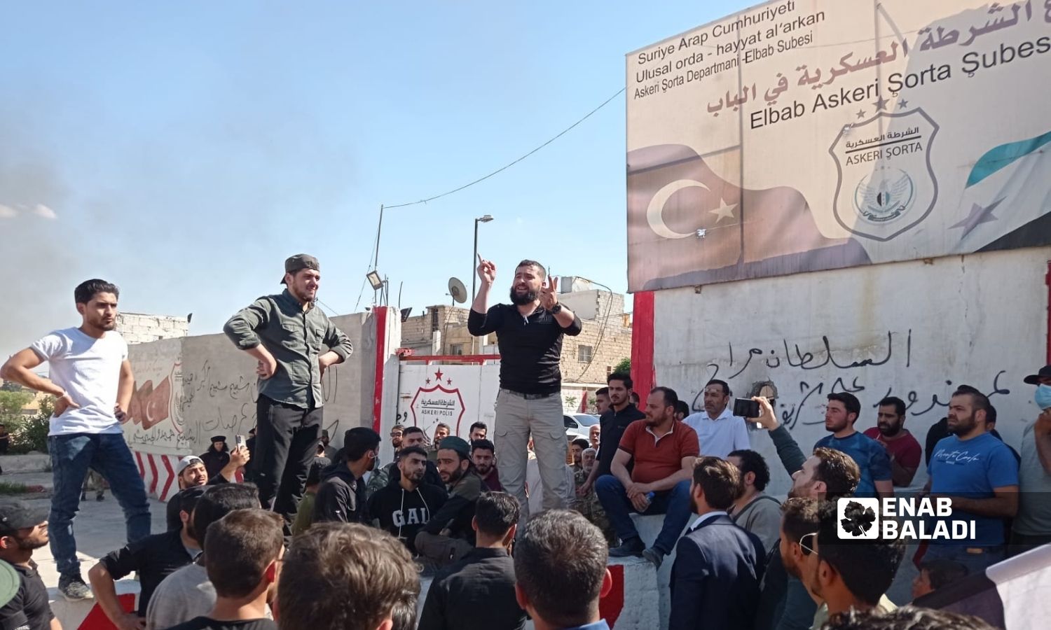 A sit-in in the city of al-Bab in the eastern countryside of Aleppo, in response to the release of a former Syrian regime fighter who involved in war violations - 18 May 2022 (Enab Baladi/Siraj Mohammad)