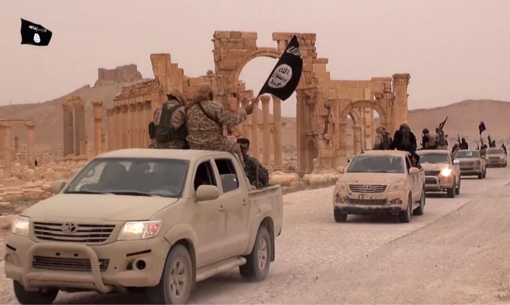 IS fighters as they entered the city of Palmyra in the eastern countryside of Homs - 2015 (Wilayat Homs / still photograph from video footage)