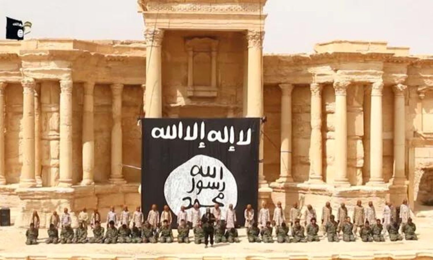 “Cubs of the Caliphate” at the moment of shooting at regime troops and allied fighters at the Roman Theater in Palmyra - July 2015 (Wilayat Homs/ screenshot from a video recording)