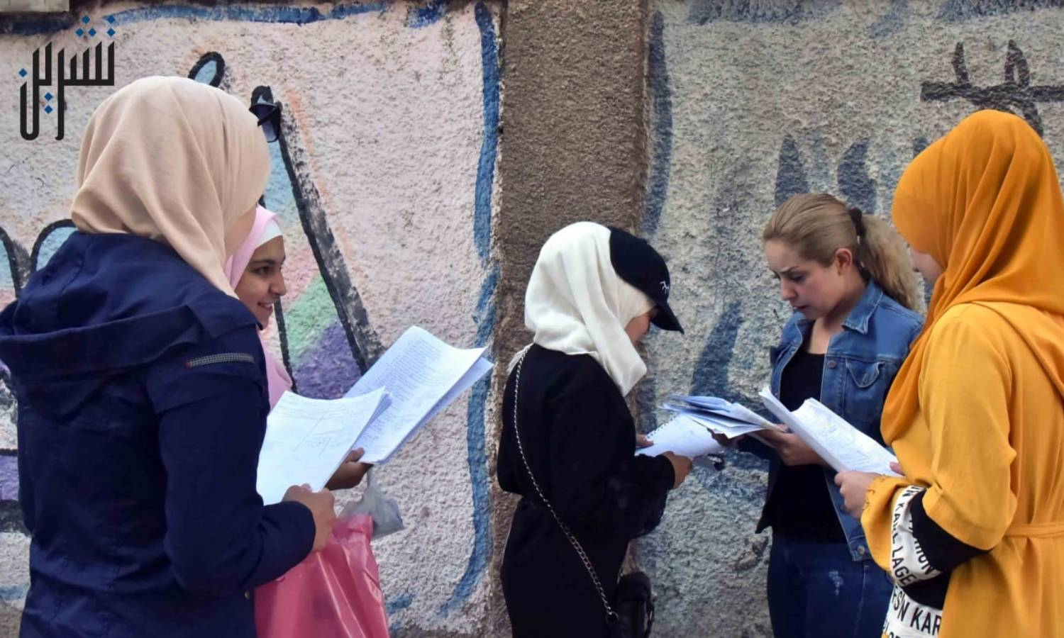 Baccalaureate students after taking the exam of “National Education” subject in Damascus (Tishreen newspaper)