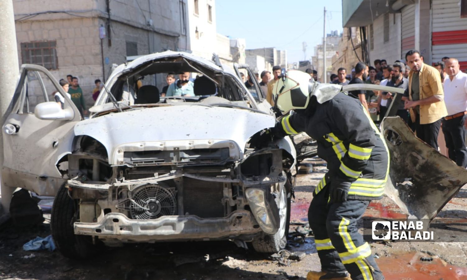 A member of the Syria Civil Defense at the scene of the explosion of an explosive device in the city of al-Bab in the eastern countryside of Aleppo - 15 June 2022 (Enab Baladi / Siraj Mohammad)